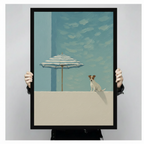 Person holding large black framed Jack Russell terrier and striped umbrella art print, showing print size and frame detail, minimalist coastal dog wall art