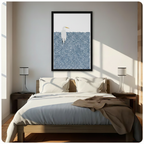 Framed minimalist white great egret standing in a field of navy blue dots wall art hung above a wooden bed with white bedding in a bright sunlit bedroom with twin lamps