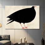Abstract black bird silhouette with red accents gallery wrap canvas print hanging on grey panel wall in contemporary living space