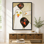 Abstract geometric pigeon family framed wall art above a wicker basket sideboard, mid-century modern white and dark bird illustration with gold textured background