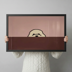 Hands in white knit sweater holding large framed bichon frise peeking canvas print - full artwork detail of minimalist two-tone line illustration with fluffy white bichon head peeking over horizontal ledge on dusty rose pink and deep chocolate brown split background