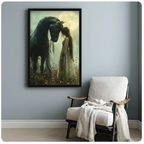 Black framed romantic dark fantasy black horse and ethereal girl in white dress sharing a tender moonlit moment in a wildflower meadow canvas print hung on a soft blue-gray wall beside a white linen wood lounge chair with cream throw