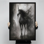 Hand-held close-up of gothic black unicorn dark fog black framed art print, detailed view of dramatic fantasy horse with wild flowing mane and sharp horn, premium dark fantasy wall decor