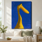 Stretched canvas wall art of a striking modern expressionist yellow duck neck portrait featuring an extreme upward-angle close-up of a long sinuous golden yellow bird neck curving upward with a broad flat beak pointing right and a tiny black eye on a saturated cobalt blue thick impasto background with visible brushwork, hung above a white sofa with sage green and cream pillows and a white ceramic table lamp in a bright airy living room