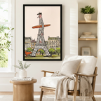 Quirky Eiffel Tower baguette illustration framed wall art styled above a linen armchair in a Scandinavian-inspired reading corner