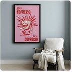More Espresso Less Depresso framed wall print in pink and red beside a cozy armchair