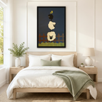 Black framed whimsical folk art stacked sheep and yellow bird canvas art with two round cream woolly sheep balanced on top of each other and a small black sheep on top with a bright yellow bird perched on its back above a rustic brown wooden fence and a wavy green grass strip on a deep navy blue background, hung above a light wood bed frame in a serene Scandinavian bedroom with crisp white linen bedding, a sage green throw blanket, white nightstands, a white ceramic table lamp, and a white vase of greenery