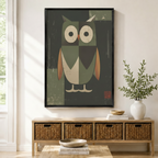 Black-framed geometric owl canvas art hung above a wicker console in a bright entryway — vintage Japanese-style bird wall decor