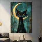 Stretched canvas gothic black cat with crescent moon wall art featuring a fierce shaggy black cat with glowing amber eyes and dramatic spiky fur framed by a luminous golden crescent moon against a deep teal and burnt gold drip-textured background with gold star splatter, hung on a gray tiled wall above a dark gray sofa 