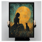 Dark romantic girl and black cat silhouette oil painting in black frame held up against a light gray backdrop, golden full moon gothic canvas wall art print with teal and amber tones
