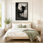 Dark gothic unicorn black framed wall art print above bed in minimalist Scandinavian bedroom with sage green accents