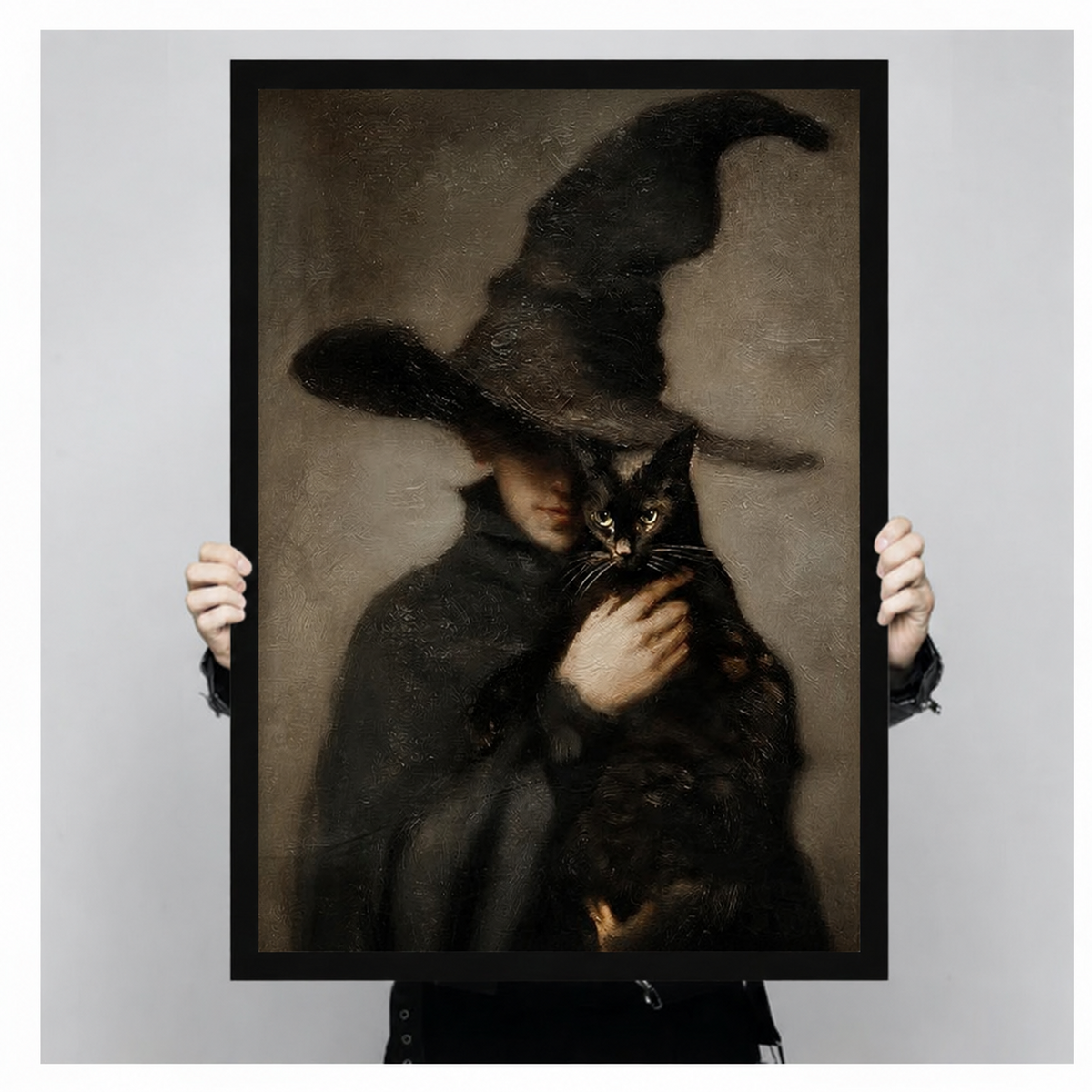 Person holding gothic witch with black cat vintage oil painting canvas art — dark academia wall decor, framed and ready to hang