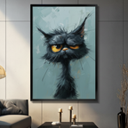 Framed canvas wall art of a grumpy black cat with wild fur and piercing yellow eyes on a dusty blue background, displayed in a moody dark living room with candle holders