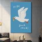 Humorous seagull canvas wrap art print with "Hide Your Fries" typography on bright blue background, frameless wrap style on grey wall