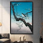 Japanese ukiyo-e style bird on plum blossom branch art print in black frame displayed in modern living room, teal blue gradient wall decor