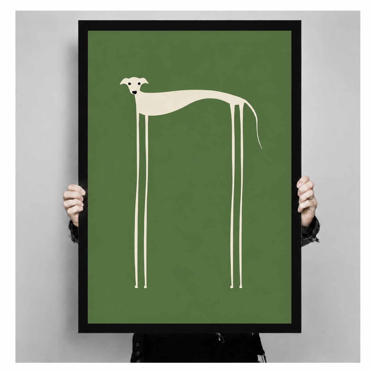 Hand-held close-up of framed long-legged dog minimalist wall art print on green background