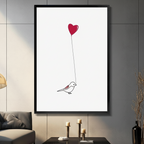 Minimalist bird heart balloon framed canvas wall art hanging in modern living room above candle holders