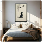 Black framed minimalist ink terrier dog silhouette watching birds on willow branch canvas art above a bed with white linen bedding, a taupe throw blanket, dark wood nightstands, and white cylindrical table lamps in a sunlit modern bedroom