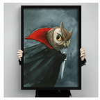 Person holding a black framed gothic owl vampire canvas print showing the red cape and dagger detail, demonstrating frame size and print quality