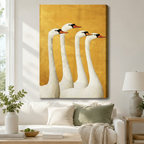 Stretched canvas wall art of a bold retro folk art four white swans group portrait featuring four graceful swans with black crowns and orange beaks arranged in a cascading row in rich impasto oil texture on a bright golden yellow aged background, hung above a white sofa with sage green and cream pillows and a ceramic table lamp in a bright airy living room