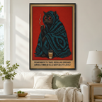 Black framed retro lazy black cat in blue ethnic blanket smoking with coffee cup "Remember to Take Regular Breaks" Japanese-style canvas art in bold red above a white sofa with sage green cushions, a taupe throw blanket, and a ceramic table lamp