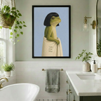 Black framed surreal frog with black bob haircut and cream take your time towel canvas art displayed in a bright white subway tile bathroom with a freestanding bathtub, brass towel bar, hanging pothos plant, and gold sconce lighting