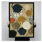 Hand-held close-up of Japanese ukiyo-e chubby cats black framed art print, detailed view of colorful round cats with polka dot pattern and kanji seal
